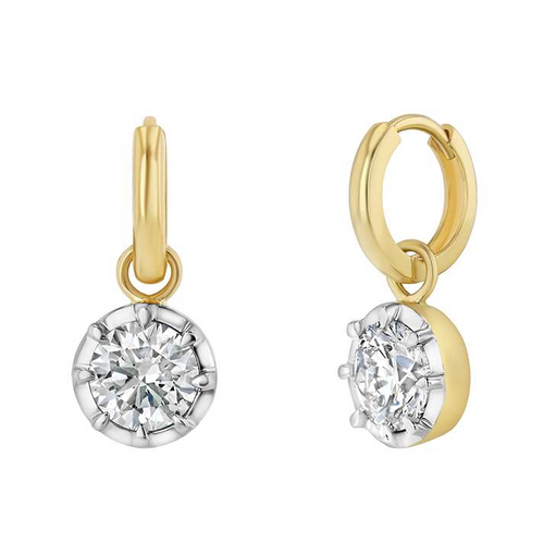 Gold hoop earrings with round gemstones on a white background